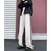 Calça de moletom esportiva patchwork estampa de leopardo hip-hop americana para homens e mulheres, marca moderna de corte solto, calça casual com listras drapeadas para dança de rua hip-hop