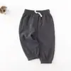 Pantalones exteriores para bebé de primavera y otoño pantalones de una sola capa para niños pantalones finos japoneses casuales pantalones con cordón en el tobillo entrega al por mayor