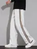 Pantalones casuales para hombre, nueva colección de otoño, caída retro, empalme de raya lateral, pantalones rectos holgados, pantalones deportivos de moda para hombre