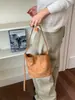 Bolso bandolera versátil de ante retro transfronterizo, moderno y minimalista, perfecto para ir al trabajo, un bolso tipo cubo de moda que se puede llevar en la mano o debajo del brazo