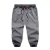 Atacado Calças Cropped Masculinas de Verão com Bolsos com Zíper Cintura Elástica Calças de Moletom Leggings Três Quartos Transfronteiriças Modernas