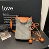 Bolsas de Palha Tecidas Estilo Coreano Transfronteiriças Femininas Verão 2026 Nova Bolsa de Ombro Cruzada Tecida Moda Casual Bolsa para Celular