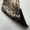 Tecido de veludo com estampa de leopardo e estamparia dourada, confortável e macio, lavável, com bom caimento, adequado para fantasias de dança de palco, atacado de tecidos