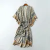 2024 Estilo Europeu e Americano Outono e Inverno Novo Atacado Feminino Viscose Estampada Posicionamento Férias Kimono Saia Longa 9231