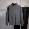 Suéter casual de punto para otoño e invierno con cuello alto apilado, nueva colección de punto al por mayor, top cálido de capa base de cuello alto, ropa para hombre transfronteriza