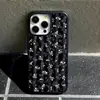 Funda de teléfono floral con rayas verticales de fondo negro para Apple 17promax funda de cristal negro iPhone18pro comercio exterior al por mayor
