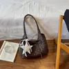 Bolso de mano de nicho estilo coreano con lazo, nueva colección de otoño 2026, bolso de hombro casual único y elegante