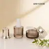 En Stock Loción de Gama Alta Esencia Tónico Botella Transparente Gris Recargable 100g Crema Crema Facial Botella Vacía de Vidrio Material de Empaque