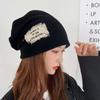 Chapéu no atacado feminino outono e inverno Novo à prova de vento Baotou chapéu frio moda tendência ins chapéu de amontoar chapéu de lã para carro elétrico