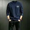 Camiseta blanca de manga larga para hombre, nuevo estilo otoño/invierno 2026, corte holgado, capa base, ropa interior, top casual para adolescentes