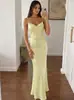Ropa de mujer de estilo francés más vendida 2026 otoño nueva moda sexy espalda hueca con cordones vestido largo de color liso para exportación al por mayor