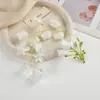 Decoración de Pared de Flores de Cadena de Lirio del Valle Simulación Corona Hecha a Mano DIY Adorno para la Cabeza Decoración de Boda Materiales de Flores Artificiales