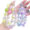Celebridad de Internet Moda Trébol de Cuatro Hojas Color Bolas Bolso Accesorios Colgante Cadena para Teléfono Móvil Super Hada Cristal Colgante Colgante de Bolas