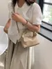 Bolso de mano vintage de rayas verticales transfronterizo para mujer, nueva moda de invierno 2025, bolso versátil de hombro y cruzado para mujer, en stock