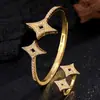 Pulseira Rakol Estrela de Quatro Pontas com Zircônia Incrustada em Cobre Luxo Acessível Joia de Mão Brilhante Estrela Vazada Estrela Full Diamond