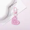 Chaveiro colorido em formato de coração com glitter, pingente fofo de resina com glitter, decoração de bolsa feminina, pequeno presente criativo