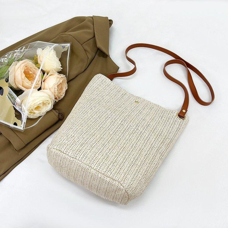 编织包女包新款潮2024夏草编简约百搭小清新水桶包个性单肩斜
