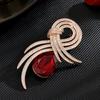 Nuevo estilo europeo de lujo exquisito Elegante alas de ángel Zafiro elegante clásico broche de abrigo entrega de una sola pieza