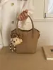 2026 Bolso Casual de Moda Estilo Nuevo con una Textura Simple y Moderna, Bolso Cubo para Invierno, Bolso Cruzado y de Hombro Personalizado para Mujer