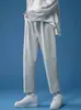 Pantalones deportivos de color sólido para otoño e invierno para hombre, modernos, holgados, de pierna recta, forrados de felpa, deportivos, casuales, recortados, versátiles y cálidos, de color sólido