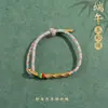 Pulseira de corda colorida zongzi do Festival do Barco-Dragão 2026 novo modelo pulseira trançada artesanal étnica infantil atacado corda vermelha