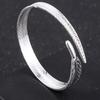 Anillo de mano de pluma de ángel abriendo la mano Pulsera de plata tailandesa de plata Xuan feather moda para parejas nuevas retro creativo una generación de pelo