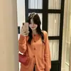 Casaco suéter feminino de estilo casual com bolsos, grosso, novo modelo de outono e inverno, caimento solto, top cardigã de tricô 100% algodão para o dia a dia