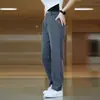 Pantalones Casuales Elásticos Nuevos de Otoño para Hombre Pantalones Largos Ajustados Rectos Versátiles Elegantes de Otoño e Invierno Marca de Moda para Hombre