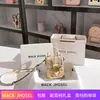 Bolsa de caja con graffiti de oso de entrega de una sola pieza 2024 bolsa mini para teléfono móvil de color de contraste avanzado al por mayor