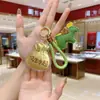 Llavero de Oro Puro 999 Creativo de Moda Colgante de Oro Bolso de Riqueza Diaria Bolsa de la Suerte Encanto Concha de Agua Mismo Estilo