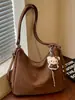 Bolsas de nicho Shuai Mi Jia, bolsa feminina de grande capacidade, mochila modelo 2026 novo, bolsa de ombro tote casual fashion