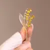 Broche de orquídea lírio-no-anel estilo antigo alta qualidade design de nicho senso de design estilo nacional clássico elegante broche corsage acessórios de vestuário